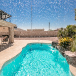 luxurious pool with waterfall